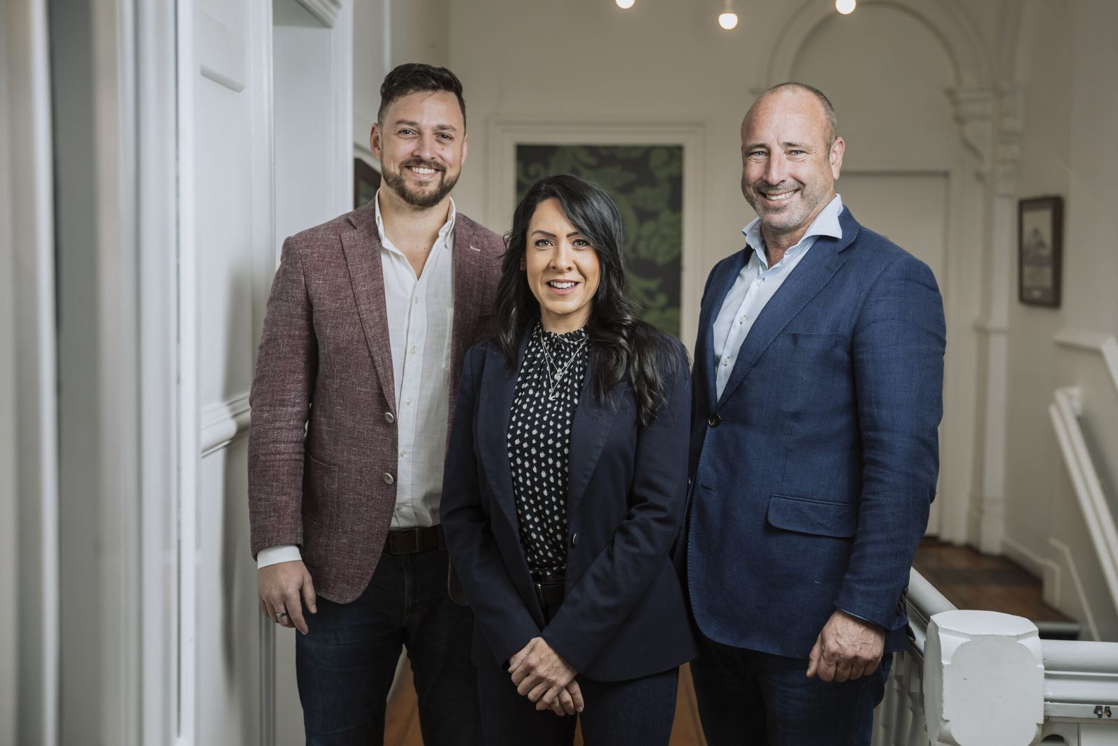 Sam Squire, Claire Corbysmith and Mark Sheehan in the Sheehan Financial office